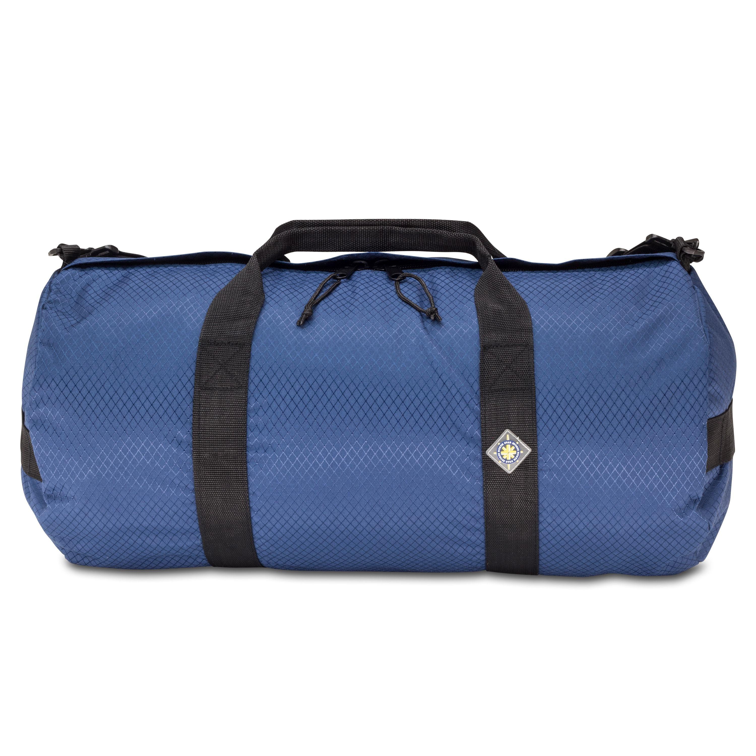 Studio photo the Pacific Blue SD1224DLX Standard Duffle by Northstar Bags. 44 liter duffel with diamond ripstop fabric, thick webbing straps, and a large format metal zipper. Guaranteed for life.