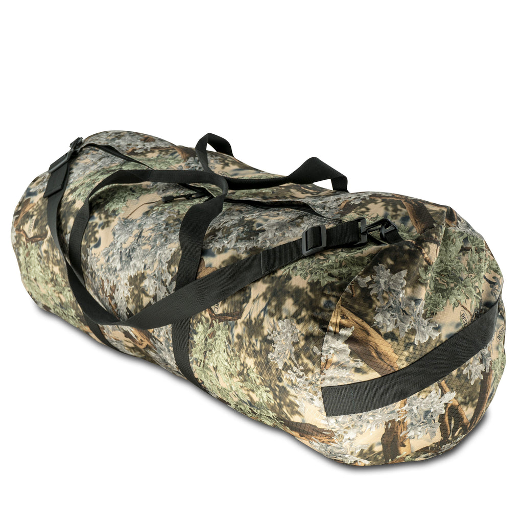 Studio photo of King's Camo Desert Shadow print SD1640DLX Standard Duffle by Northstar Bags. 131 liter duffel with diamond ripstop fabric, thick webbing straps, and a large format metal zipper. Guaranteed for life.