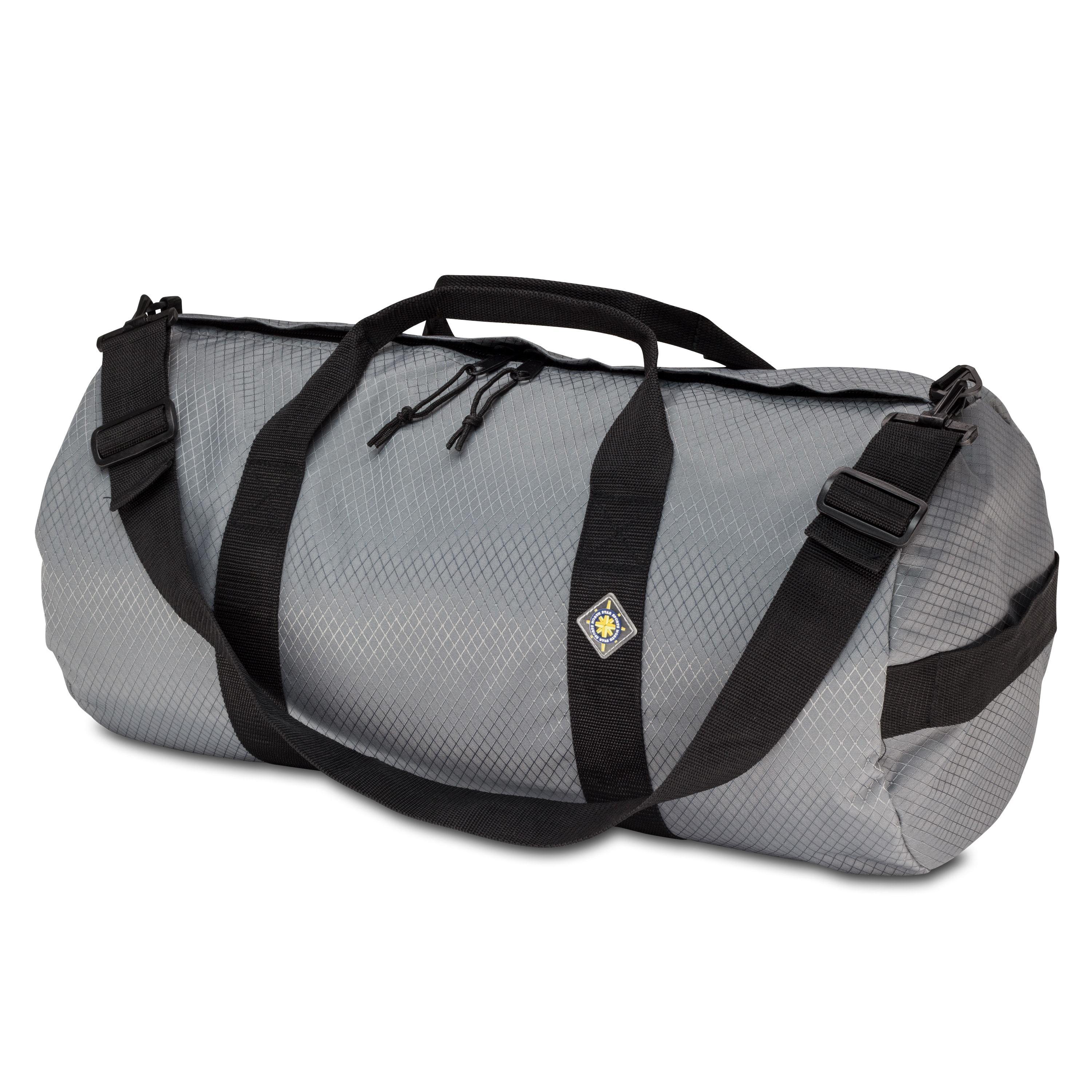 Studio photo the Steel Grey SD1224DLX Standard Duffle by Northstar Bags. 44 liter duffel with diamond ripstop fabric, thick webbing straps, and a large format metal zipper. Guaranteed for life.