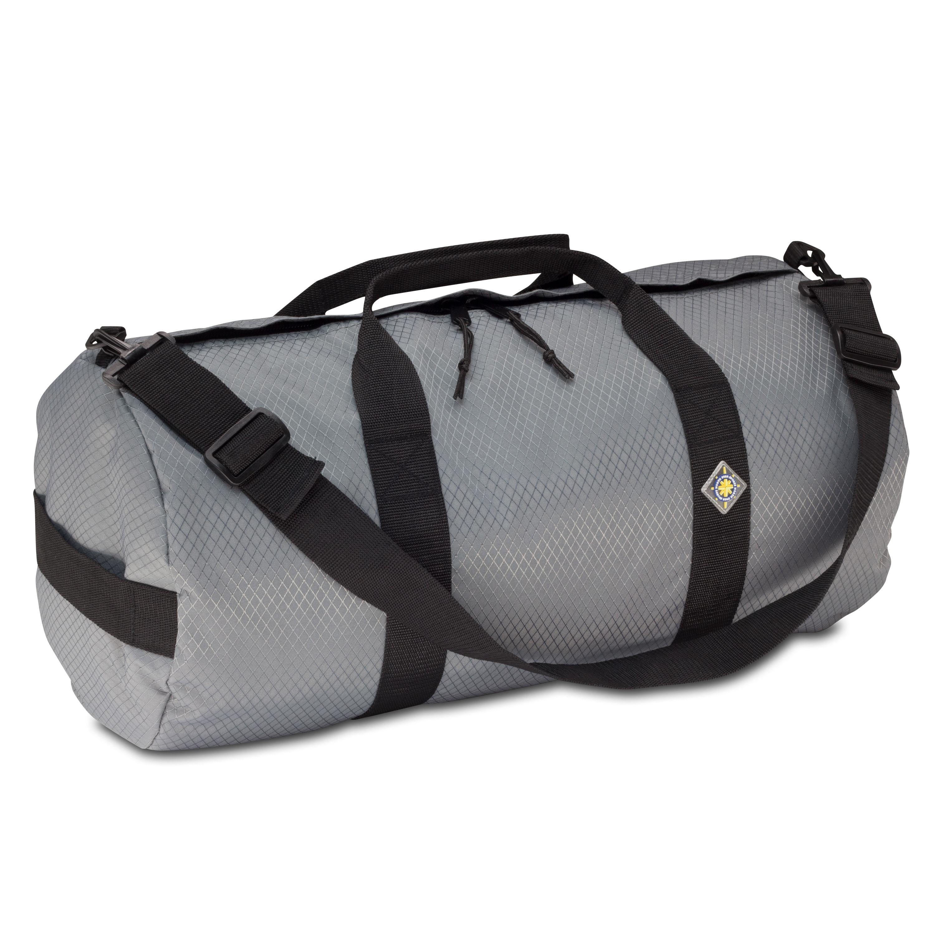 Studio photo the Steel Grey SD1224DLX Standard Duffle by Northstar Bags. 44 liter duffel with diamond ripstop fabric, thick webbing straps, and a large format metal zipper. Guaranteed for life.