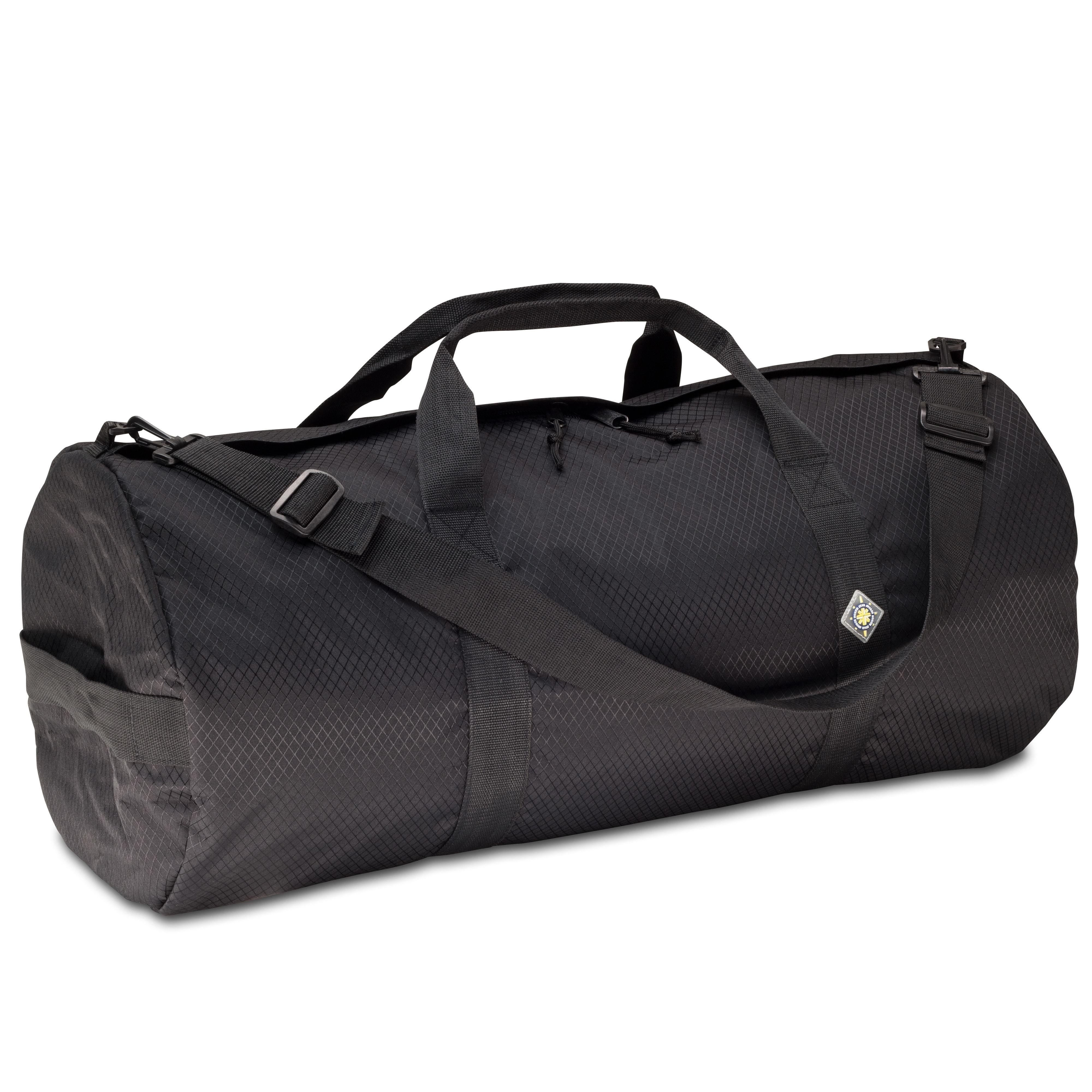 Studio photo the Midnight Black SD1430DLX Standard Duffle by Northstar Bags. 75 liter duffel with diamond ripstop fabric, thick webbing straps, and a large format metal zipper. Guaranteed for life.