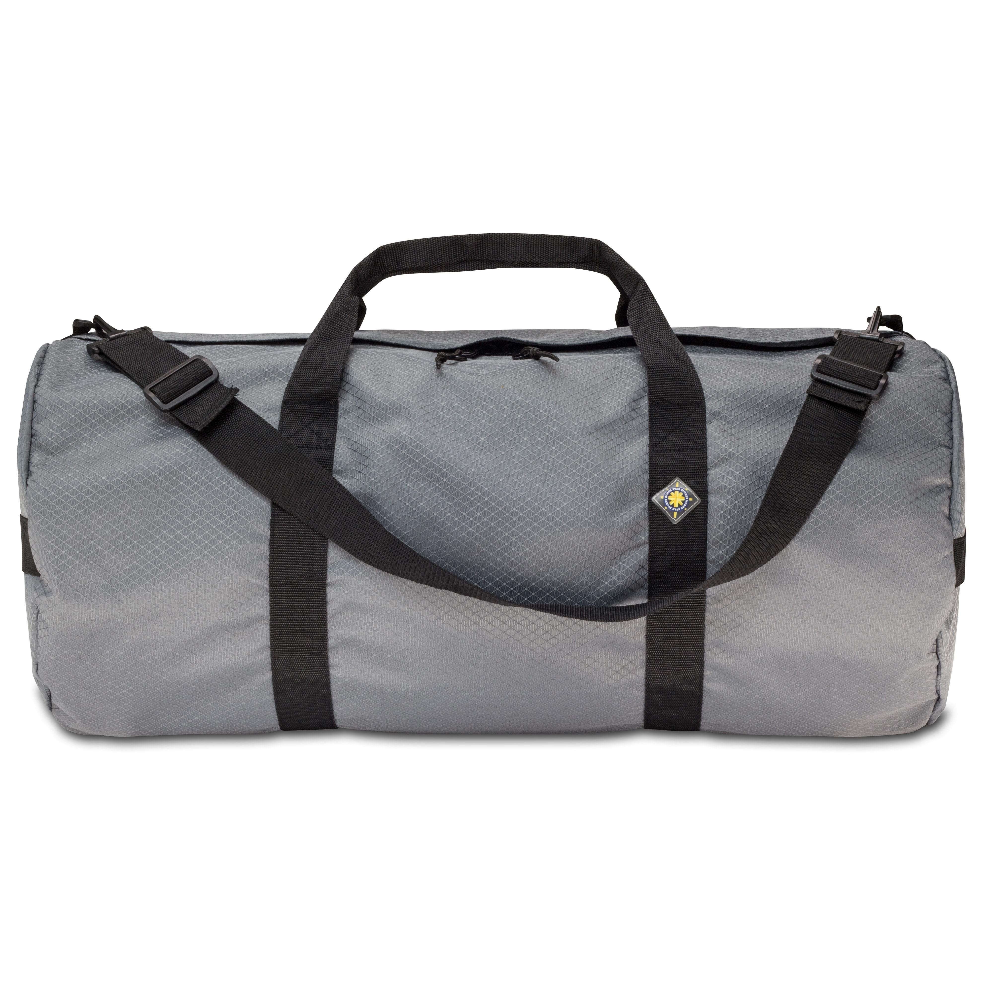 Studio photo the Steel Grey SD1430DLX Standard Duffle by Northstar Bags. 75 liter duffel with diamond ripstop fabric, thick webbing straps, and a large format metal zipper. Guaranteed for life.