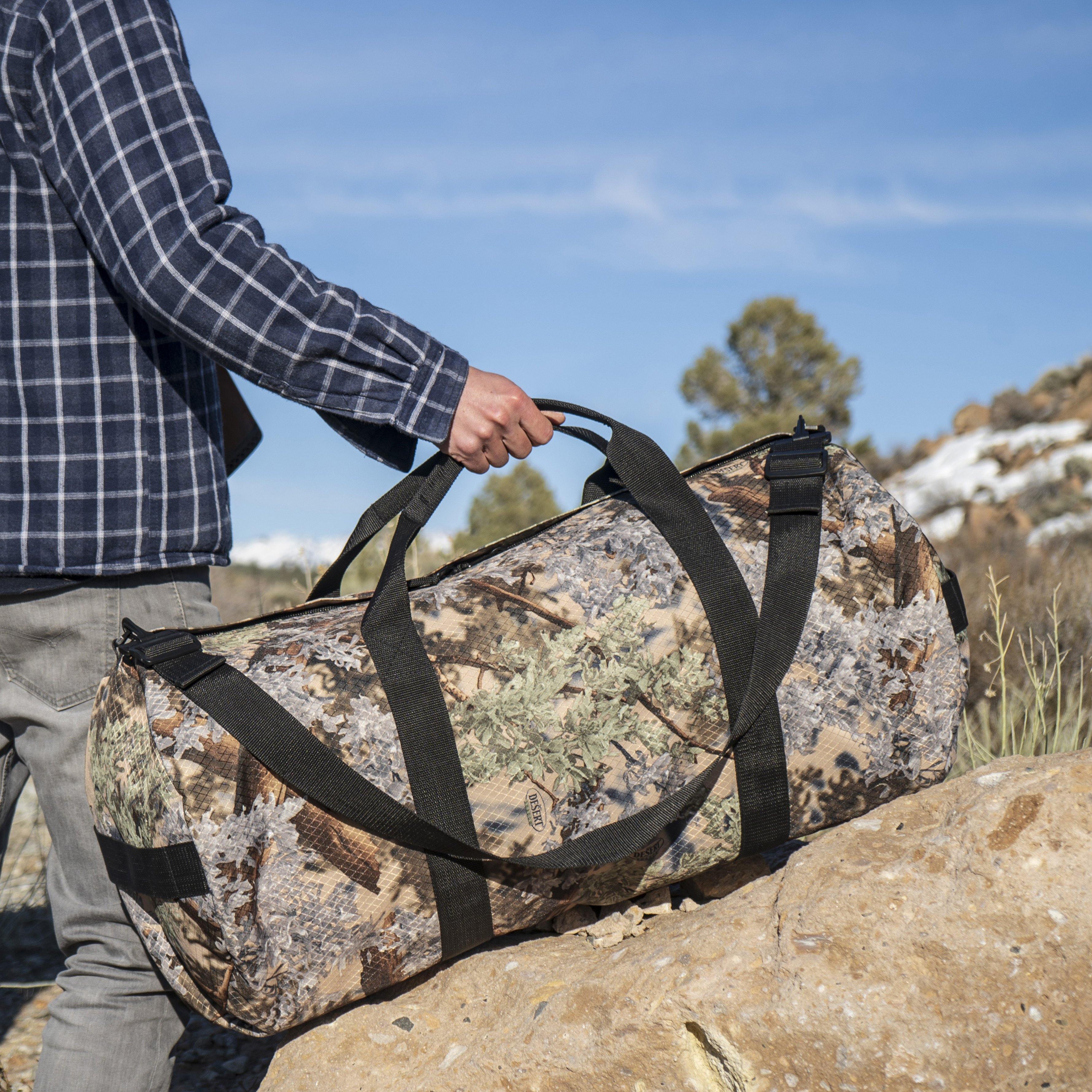 Lifestyle photo of King's Camo Desert Shadow print SD1430DLX Standard Duffle by Northstar Bags. 75 liter duffel with diamond ripstop fabric, thick webbing straps, and a large format metal zipper. Guaranteed for life.