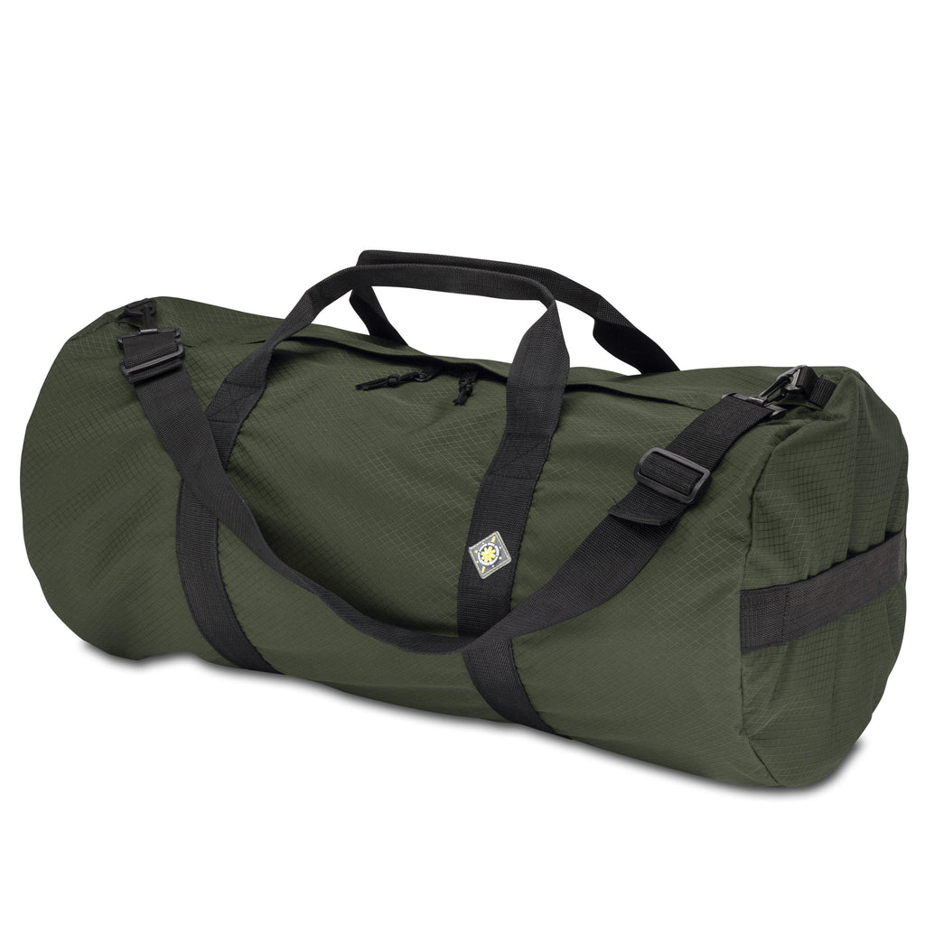 Studio photo the Forestry Green SD1430DLX Standard Duffle by Northstar Bags. 75 liter duffel with diamond ripstop fabric, thick webbing straps, and a large format metal zipper. Guaranteed for life.